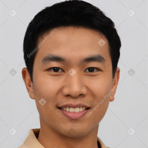 Joyful asian young-adult male with short  black hair and brown eyes