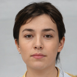 Neutral white young-adult female with medium  brown hair and brown eyes