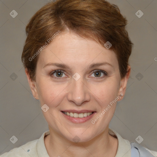 Joyful white adult female with short  brown hair and grey eyes