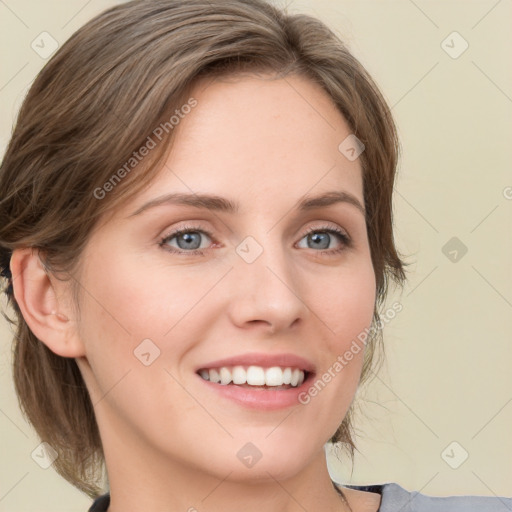 Joyful white young-adult female with medium  brown hair and blue eyes