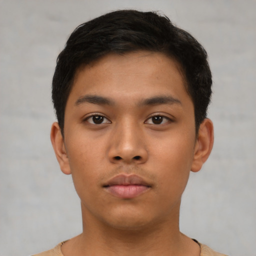 Neutral asian young-adult male with short  brown hair and brown eyes