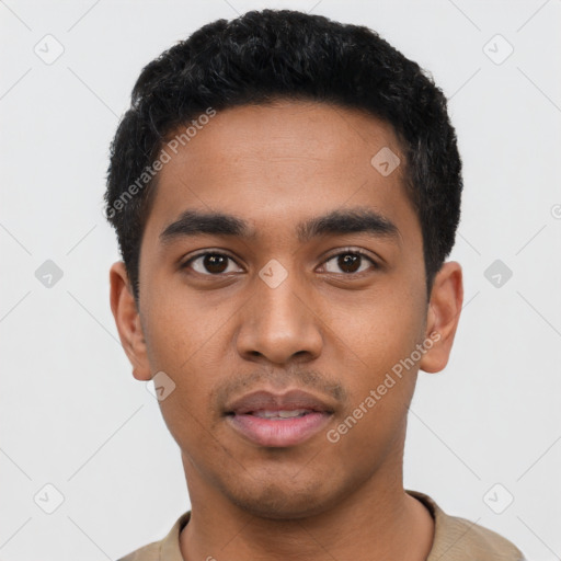 Neutral latino young-adult male with short  black hair and brown eyes