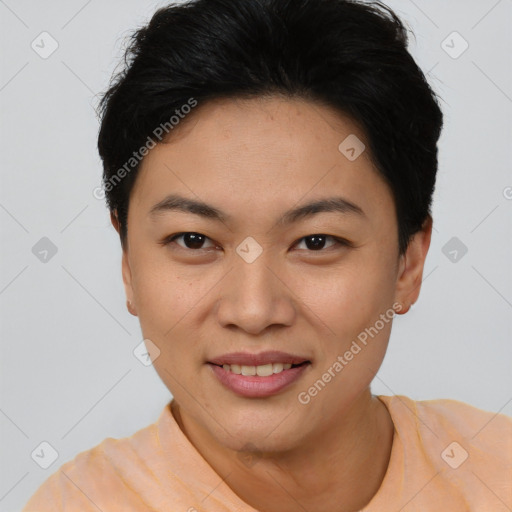 Joyful asian young-adult female with short  black hair and brown eyes