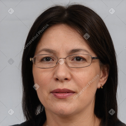 Joyful white adult female with medium  brown hair and brown eyes