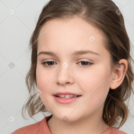 Joyful white child female with medium  brown hair and brown eyes