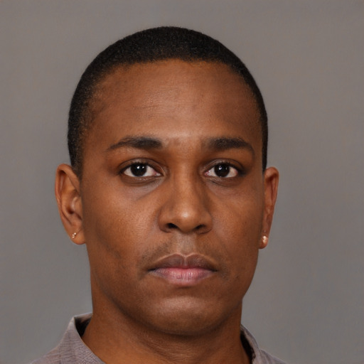 Neutral black young-adult male with short  brown hair and brown eyes