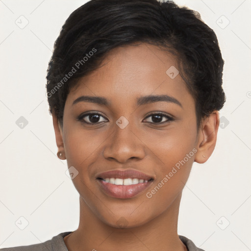 Joyful black young-adult female with short  black hair and brown eyes