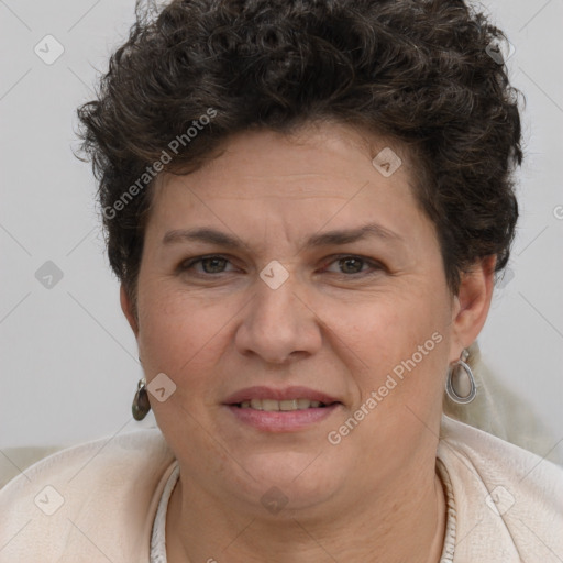 Joyful white adult female with short  brown hair and brown eyes