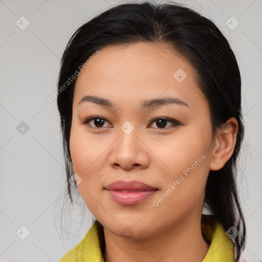 Joyful asian young-adult female with medium  brown hair and brown eyes