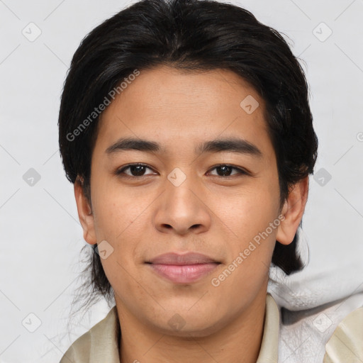 Joyful asian young-adult male with short  brown hair and brown eyes