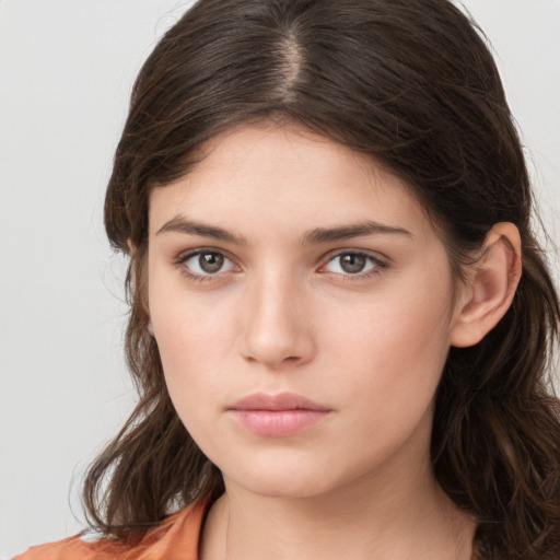 Neutral white young-adult female with medium  brown hair and brown eyes