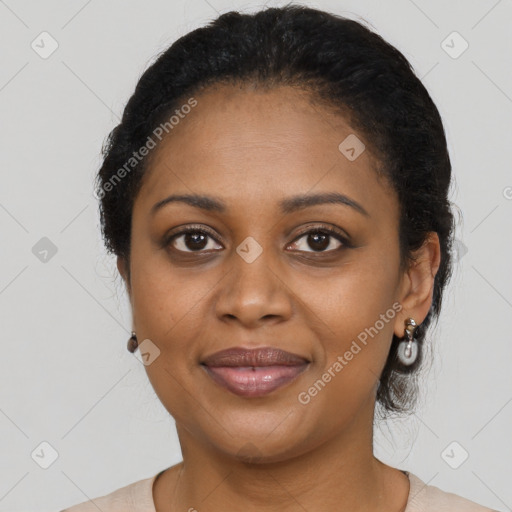 Joyful black young-adult female with medium  black hair and brown eyes