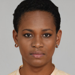 Neutral black young-adult female with short  brown hair and brown eyes