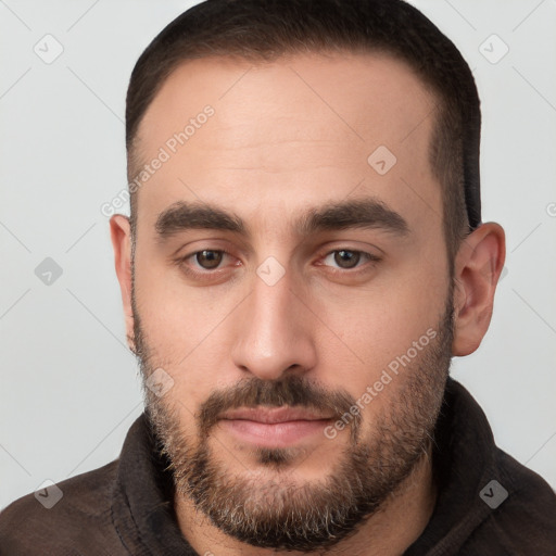 Neutral white young-adult male with short  brown hair and brown eyes