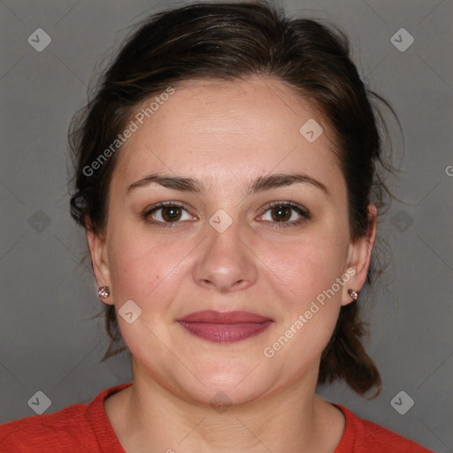 Joyful white adult female with medium  brown hair and brown eyes