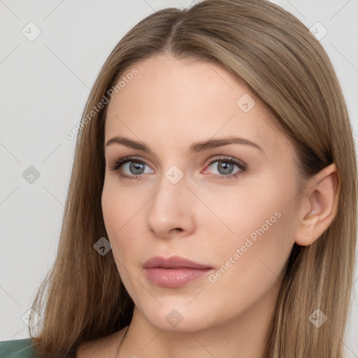 Neutral white young-adult female with long  brown hair and brown eyes