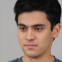 Neutral asian young-adult male with short  black hair and brown eyes