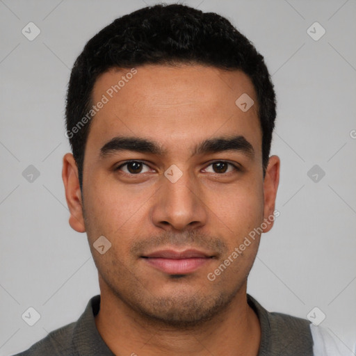 Neutral latino young-adult male with short  black hair and brown eyes