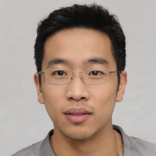 Neutral asian young-adult male with short  black hair and brown eyes