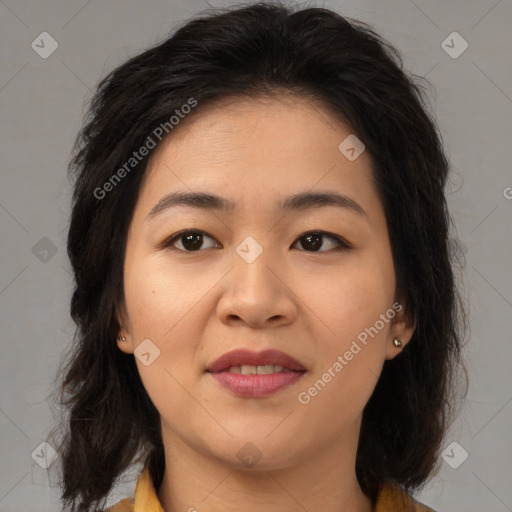 Joyful asian young-adult female with medium  brown hair and brown eyes