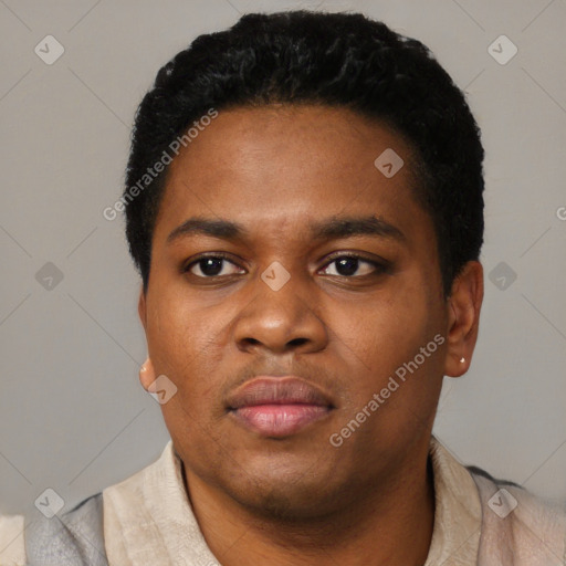 Neutral black young-adult male with short  black hair and brown eyes