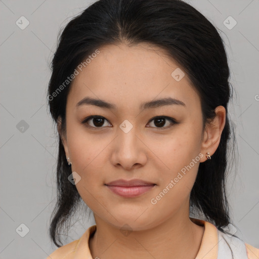 Joyful asian young-adult female with medium  black hair and brown eyes