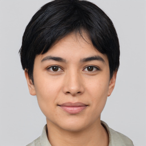 Joyful asian young-adult female with short  black hair and brown eyes