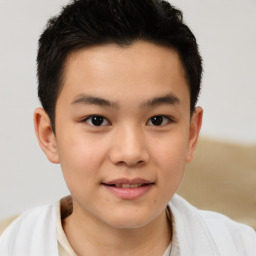 Joyful white child male with short  brown hair and brown eyes