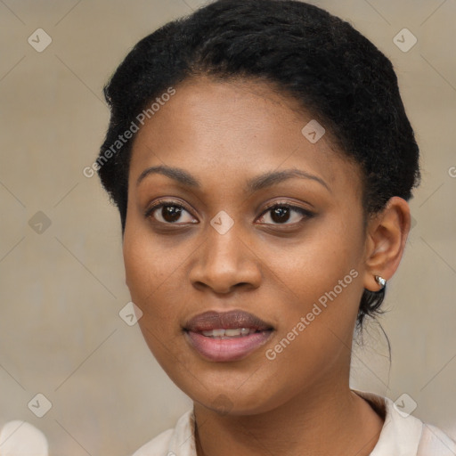 Joyful black young-adult female with short  black hair and brown eyes