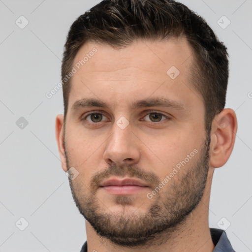 Neutral white young-adult male with short  brown hair and brown eyes