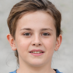 Joyful white child female with medium  brown hair and grey eyes