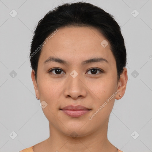 Joyful asian young-adult female with short  brown hair and brown eyes