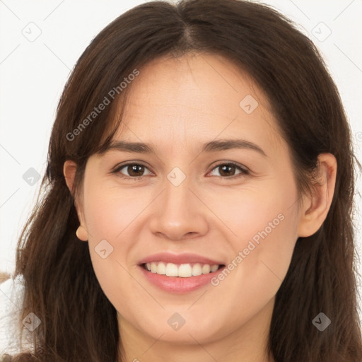 Joyful white young-adult female with long  brown hair and brown eyes