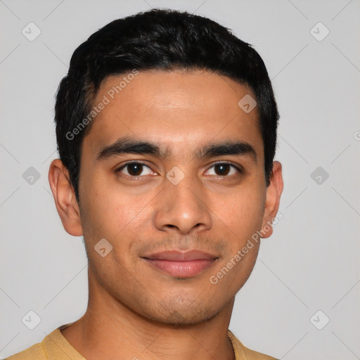 Joyful latino young-adult male with short  black hair and brown eyes