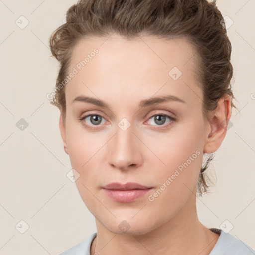 Neutral white young-adult female with short  brown hair and brown eyes