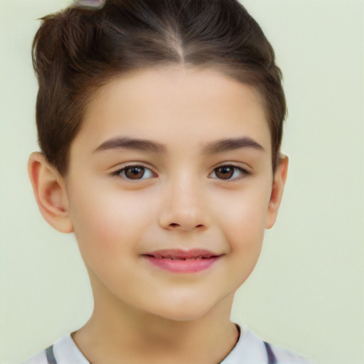 Joyful white child female with short  brown hair and brown eyes