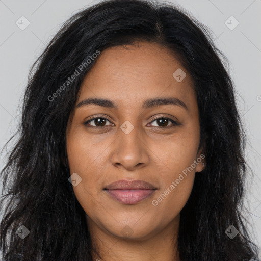 Joyful latino young-adult female with long  brown hair and brown eyes