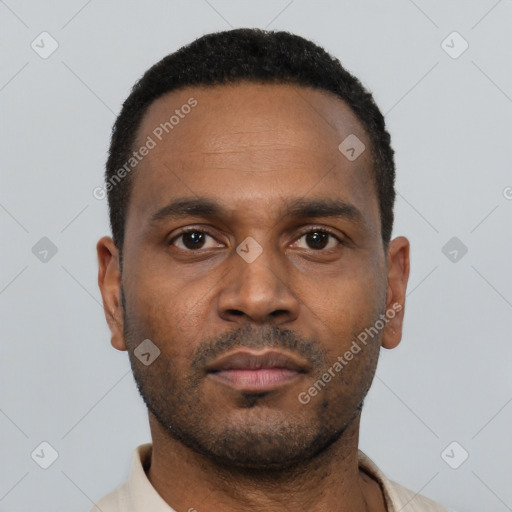 Neutral latino young-adult male with short  black hair and brown eyes
