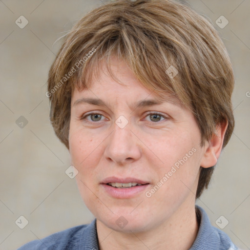 Joyful white adult female with medium  brown hair and blue eyes