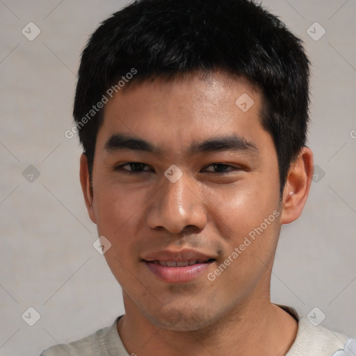 Joyful asian young-adult male with short  black hair and brown eyes