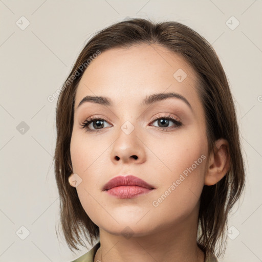 Neutral white young-adult female with medium  brown hair and brown eyes