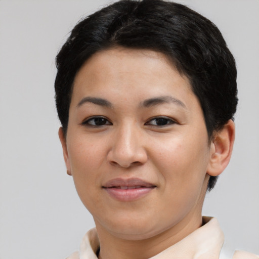 Joyful asian young-adult female with short  brown hair and brown eyes