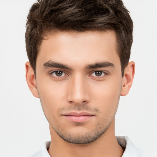 Neutral white young-adult male with short  brown hair and brown eyes