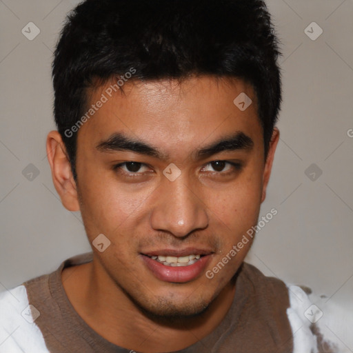 Joyful asian young-adult male with short  brown hair and brown eyes