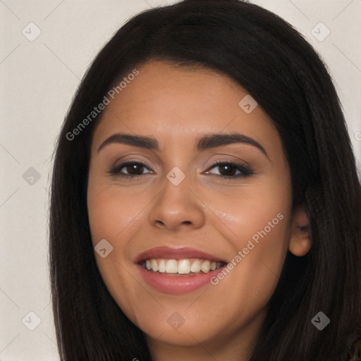 Joyful latino young-adult female with long  brown hair and brown eyes