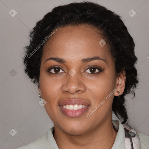 Joyful black young-adult female with medium  black hair and brown eyes