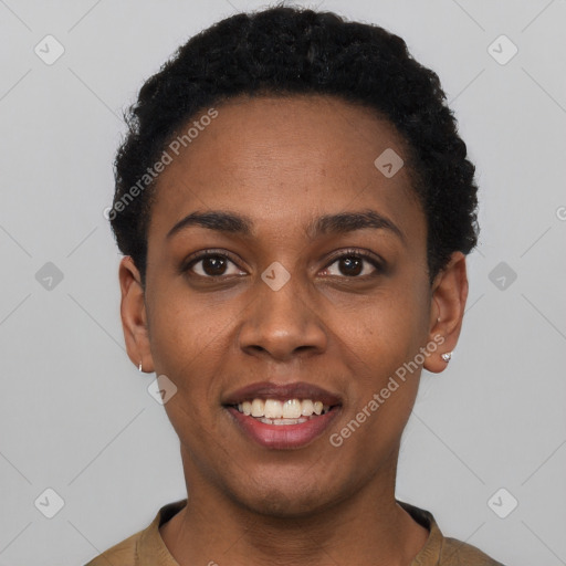 Joyful black young-adult female with short  black hair and brown eyes