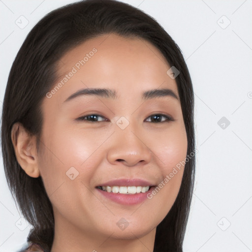 Joyful white young-adult female with long  brown hair and brown eyes