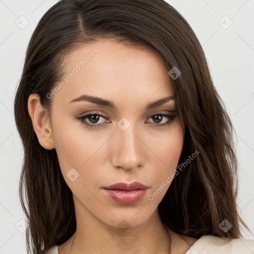 Neutral white young-adult female with long  brown hair and brown eyes