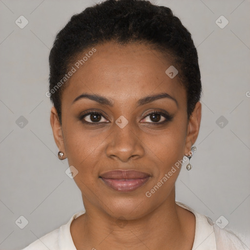 Joyful black young-adult female with short  black hair and brown eyes